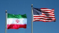 Ilustrasi Bendera Iran dan Amerika Serikat (AS)/REUTER